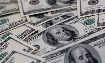 Dólar e bolsa fecham estáveis com trégua nos Estados Unidos