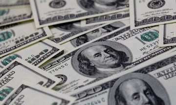 Dólar cai para R$ 5,68 com mercado externo mais tranquilo